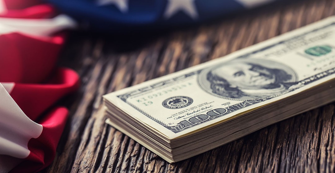 FX-Mittagsbericht: US-Dollar profitiert von hawkischem Fed-Ausblick