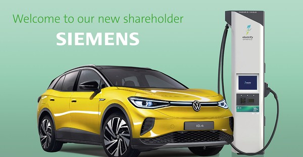 Gelbes Elektroauto neben Ladestation, Text: "Welcome to our new shareholder Siemens".